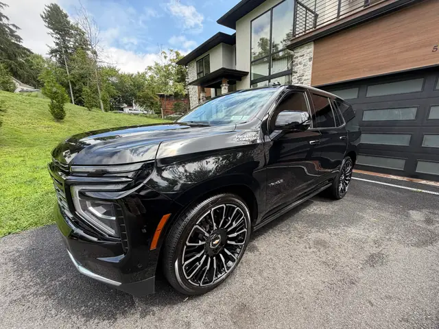 A freshly detailed black SUV from KevCleanedIt’s gallery
